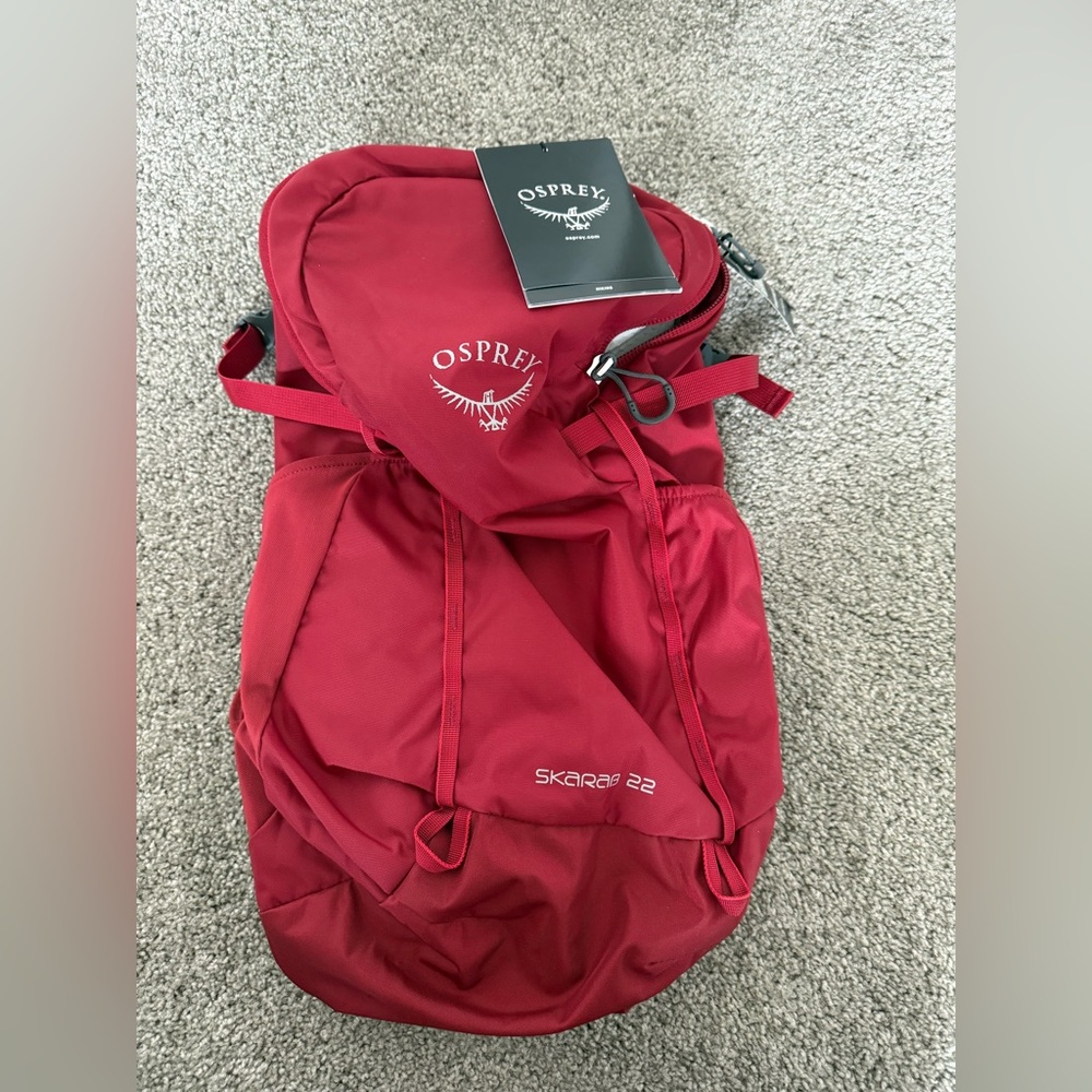 Ospray Skarab 22 hydration backpack, red, new with tags.
